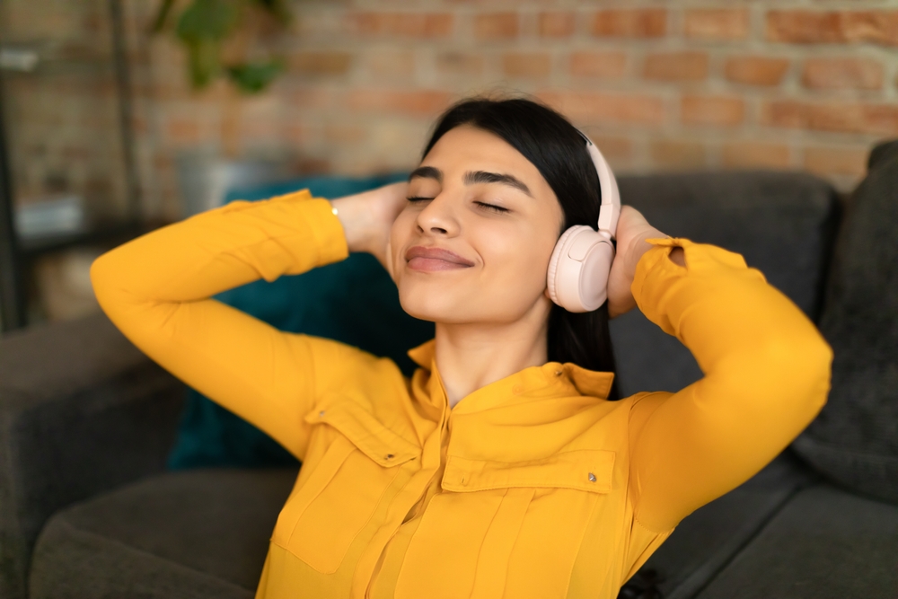 woman wearing wireless headphones