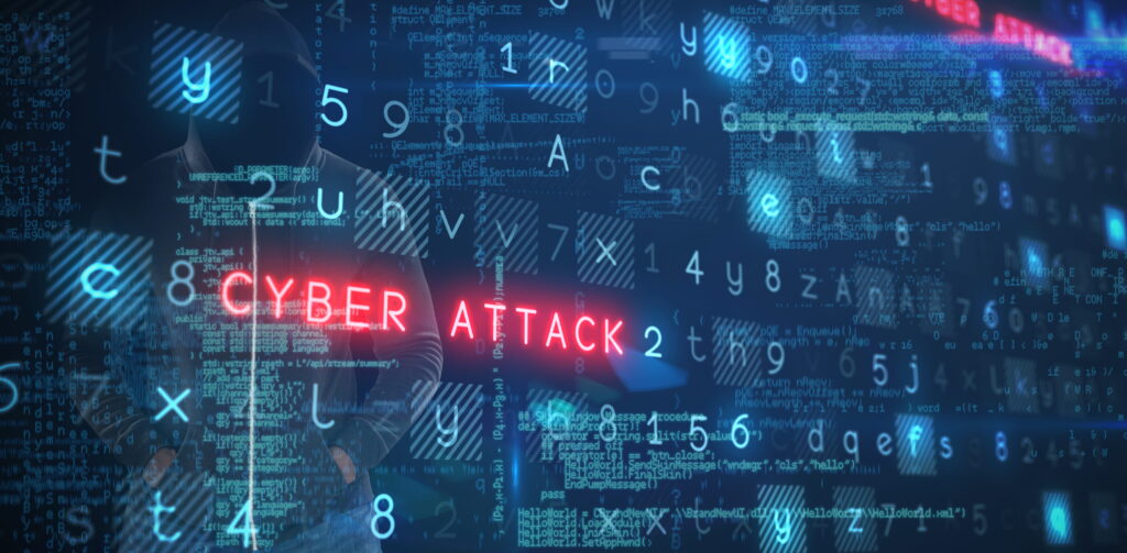 Hooded hacker silhouette against a dark background with glowing red "Cyber Attack" text and code