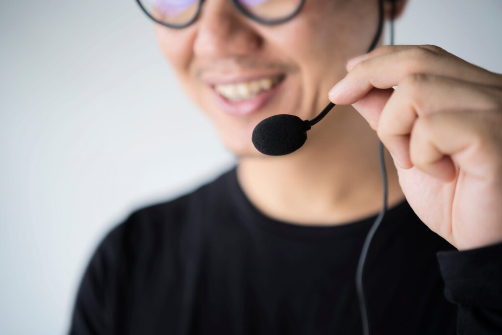 Customer service representative wearing a headset for business calls