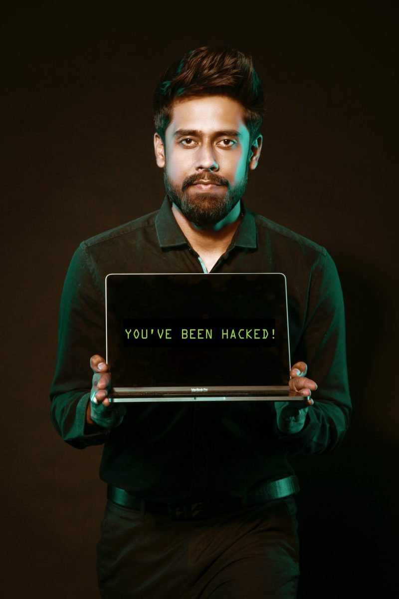 man-holding-laptop-computer-with-both-hands-2036656 man-holding-laptop-computer-with-both-hands-2036656